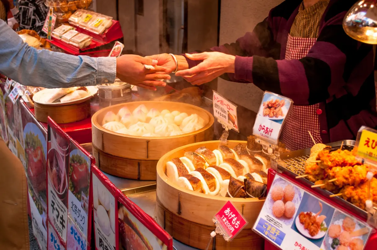 Street stalls selling pork buns and dumplings
