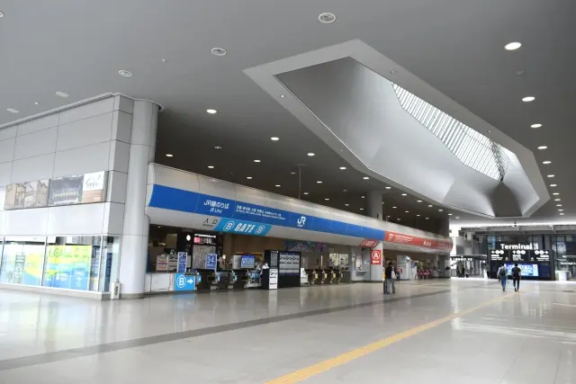 Ticket machines at Kansai Airport Station for purchasing Nankai Rapit train tickets.