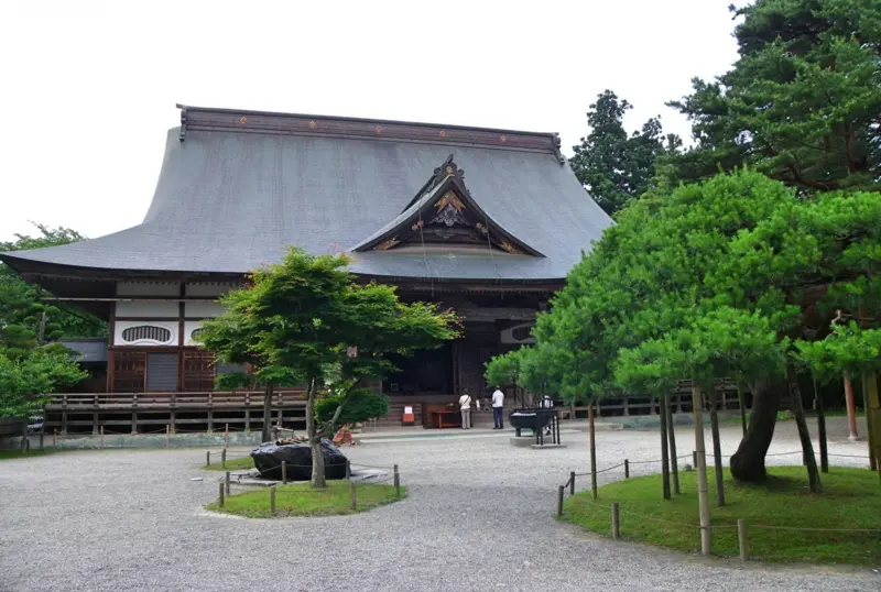 Hiraizumi's Chusonji Temple surrounded by lush greenery