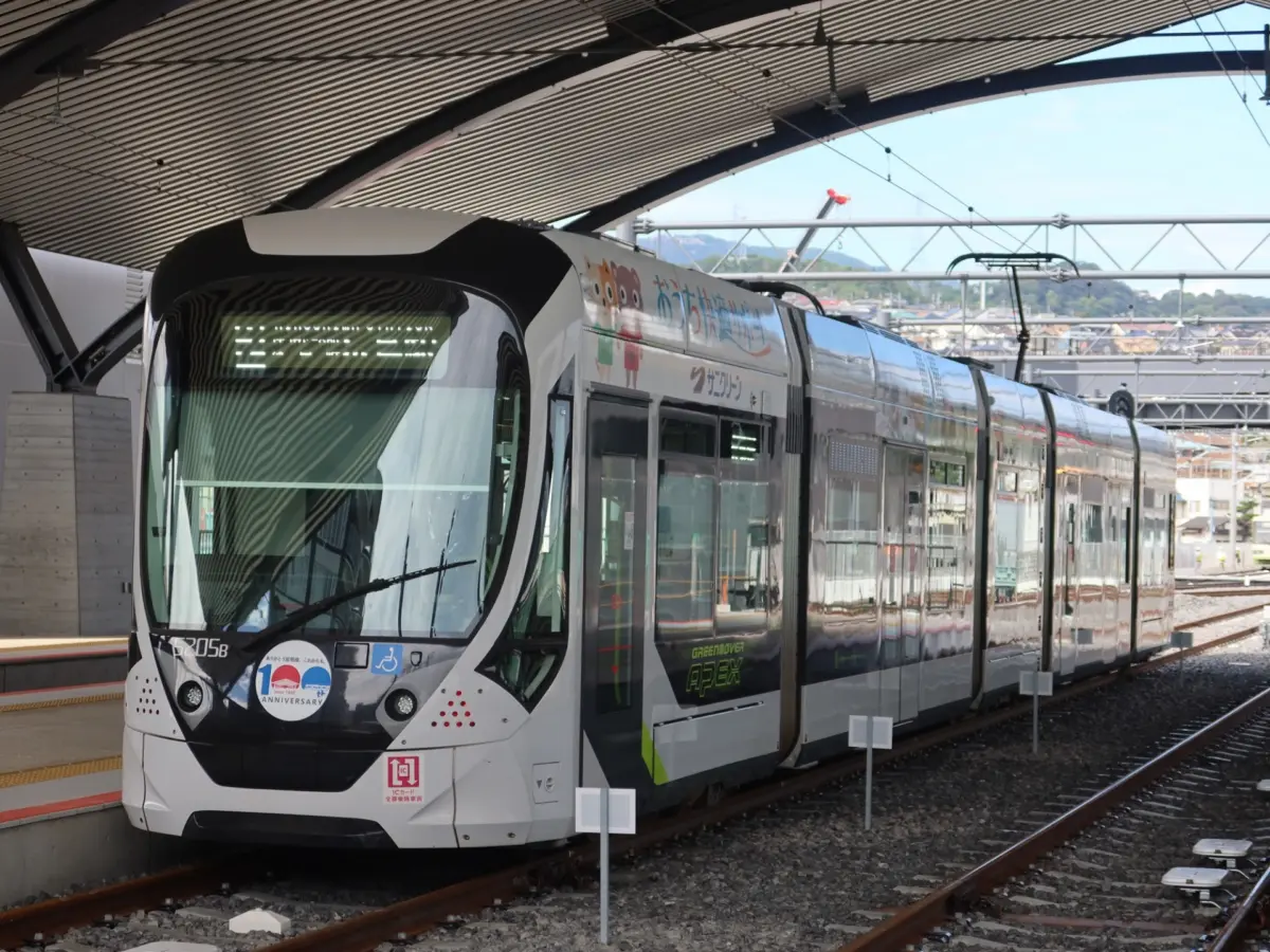 A tram running through the streets of Hiroshima city.