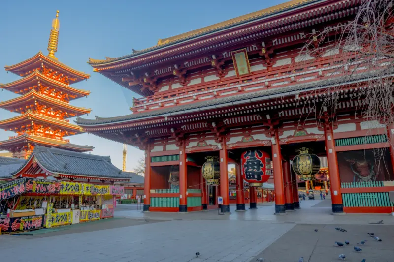 Senso-ji Temple in Tokyo with a red pagoda and visitors