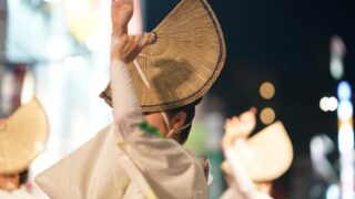 Awa Odori dancer performing gracefully in traditional attire.