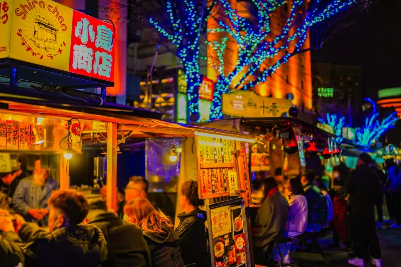 Yatai food stalls lined up at night in Fukuoka