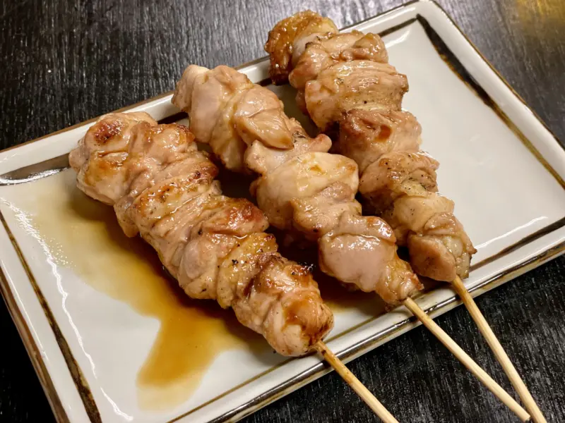  Yakitori being grilled on an open flame