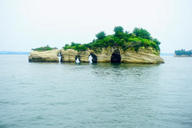  Scenic view of Matsushima Bay with its iconic pine-covered islands.
