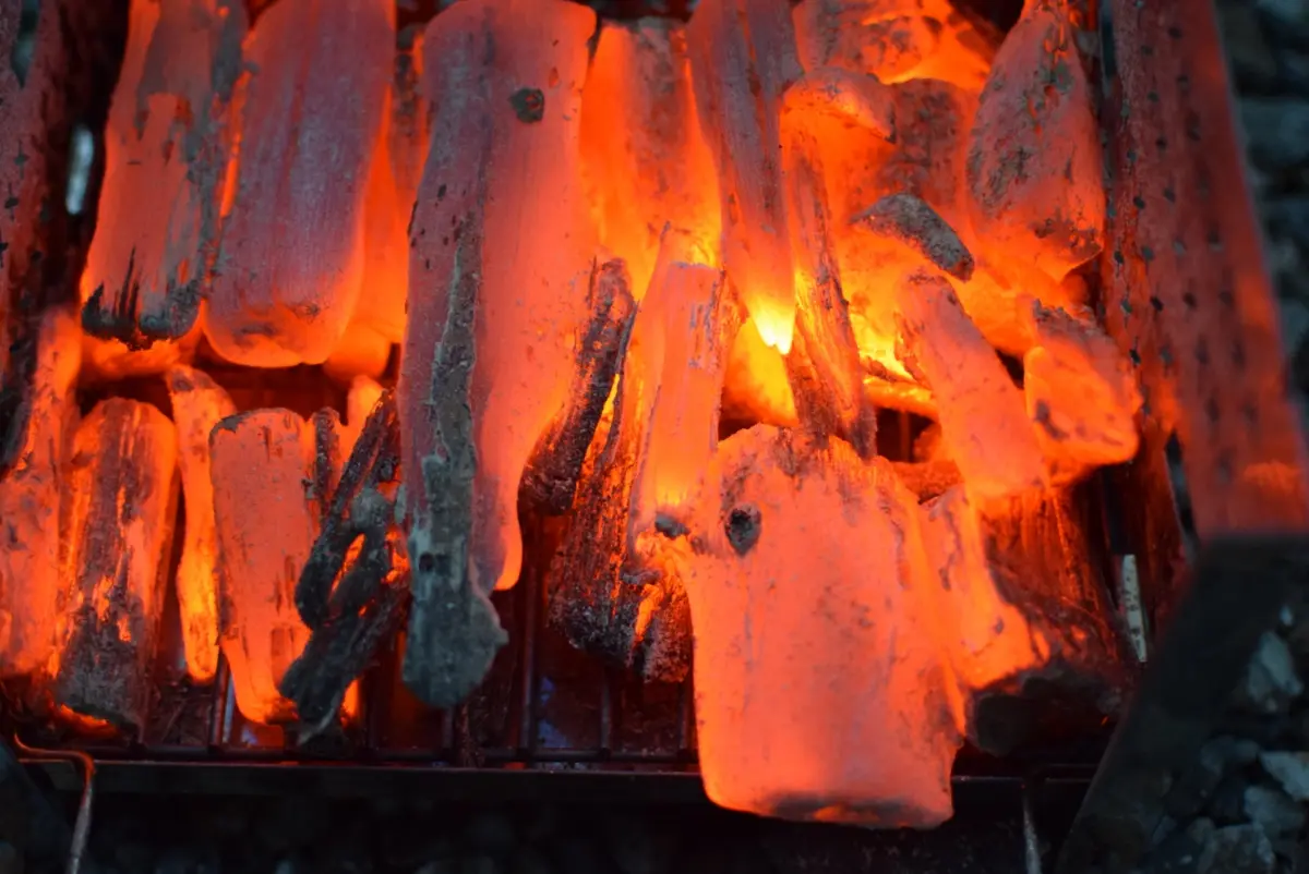 glowing red binchotan charcoal for yakitori in Japan
