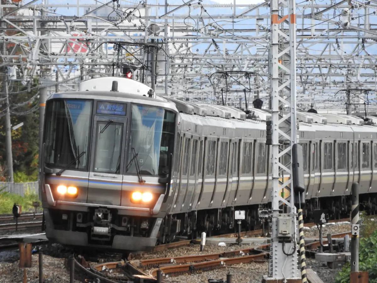 A JR train arriving at Osaka Station.