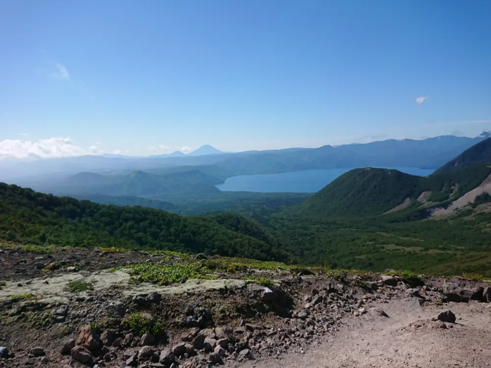 Hikers enjoying scenic trails near Lake Shikotsu.