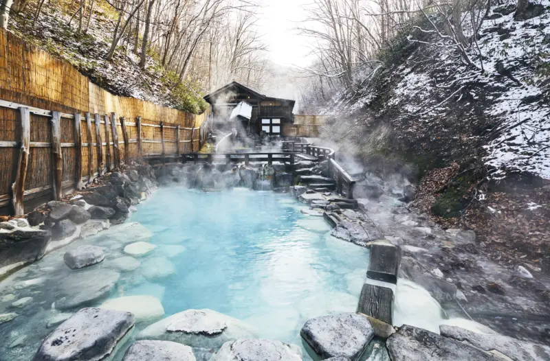 Zao Onsen's outdoor bath surrounded by snow during winter