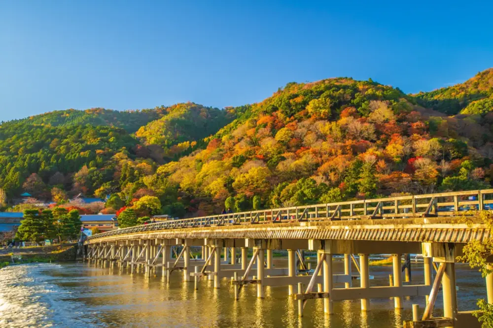 togetukyo Togetsukyo Bridge with a backdrop of vibrant autumn foliage in Arashiyama.
