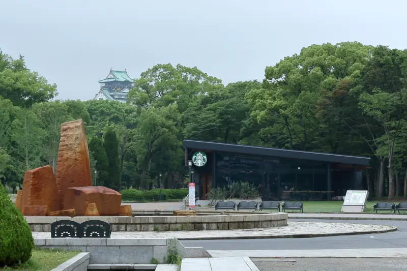 Osaka Castle Park Starbucks with views of the castle and lush greenery