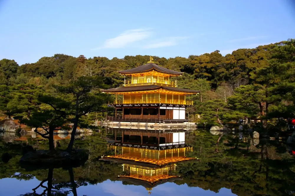 Reflection of Kinkakuji on the calm surface of the Mirror Pond
