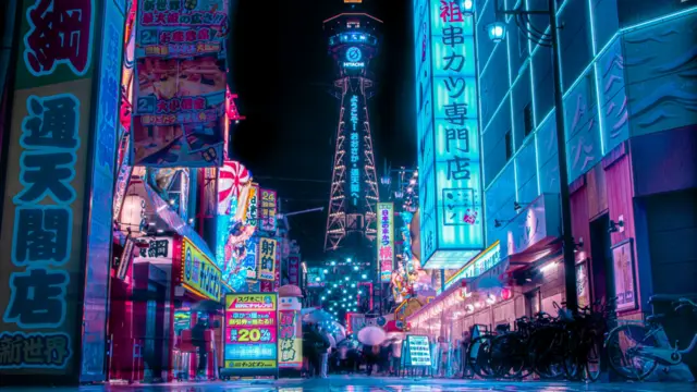 Neon-lit Tsutenkaku Tower in Shinsekai.
