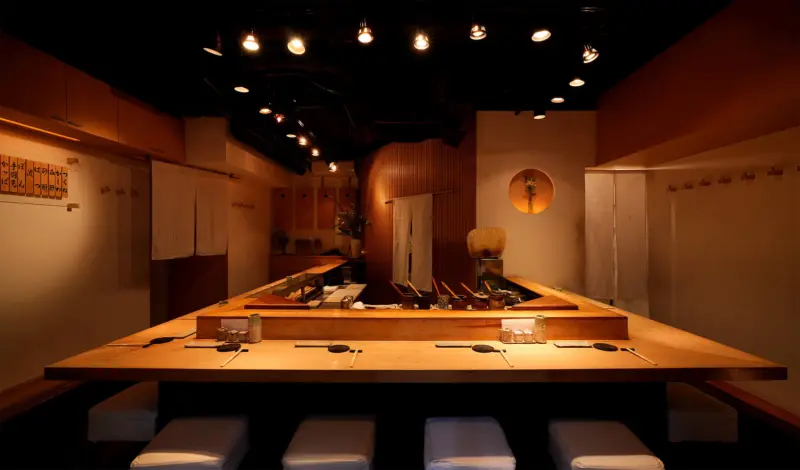 Interior of a cozy yakitori restaurant in Tokyo