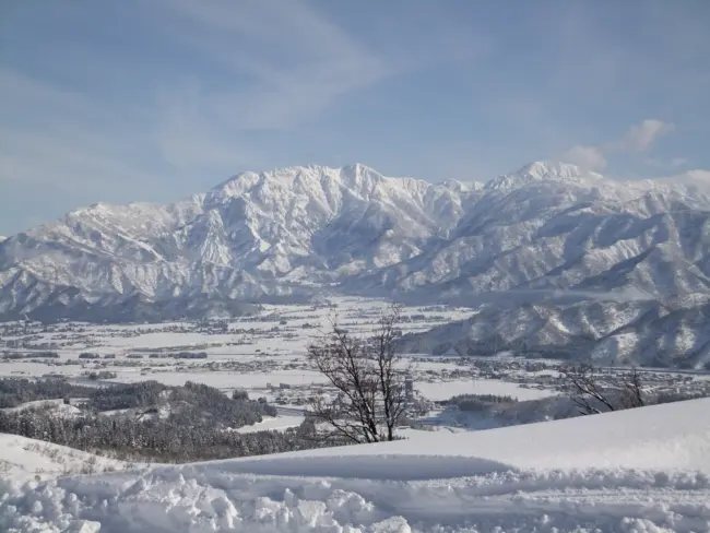 Snow-covered slopes of Echigo-Yuzawa, a premier winter sports destination.