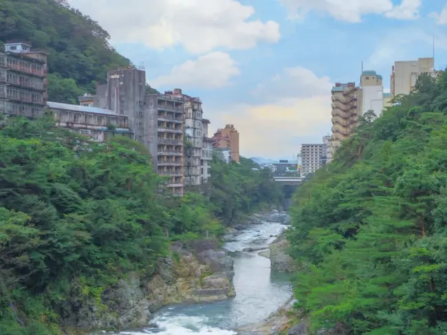 Kinugawa Onsen, a hot spring town known for its relaxing baths and scenic river views.