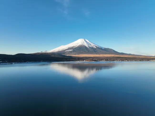 The serene Lake Kawaguchi with Mount Fuji in the background.