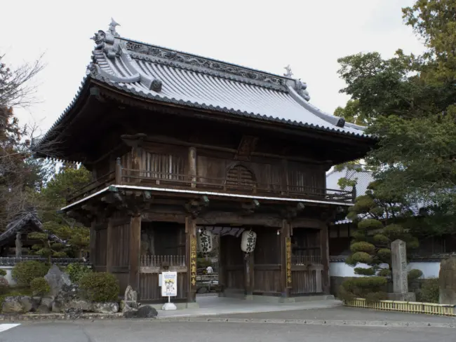The serene gardens and statues of Ryozenji Temple, the starting point of the Shikoku Pilgrimage