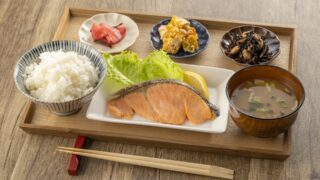 Grilled fish, miso soup, and rice – a traditional Japanese breakfast.