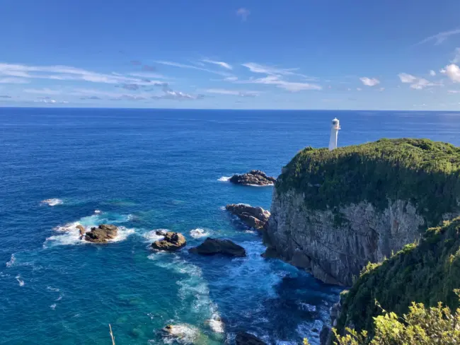 The Ashizuri Lighthouse and rugged coastline at Cape Ashizuri, Kochi’s southernmost point.