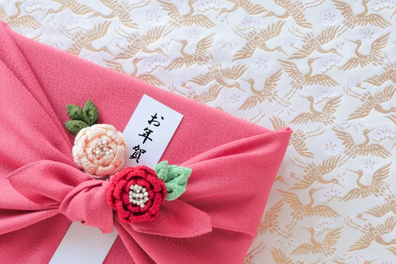 Colorful and elegantly wrapped Japanese souvenirs in a shop.