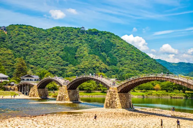 The iconic Kintaikyo Bridge with its elegant five-arch design spanning the Nishiki River in Yamaguchi