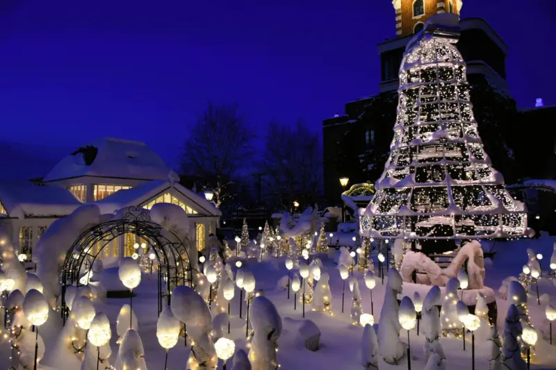 The picturesque entrance to Shiroi Koibito Park in Sapporo, featuring European-style architecture.