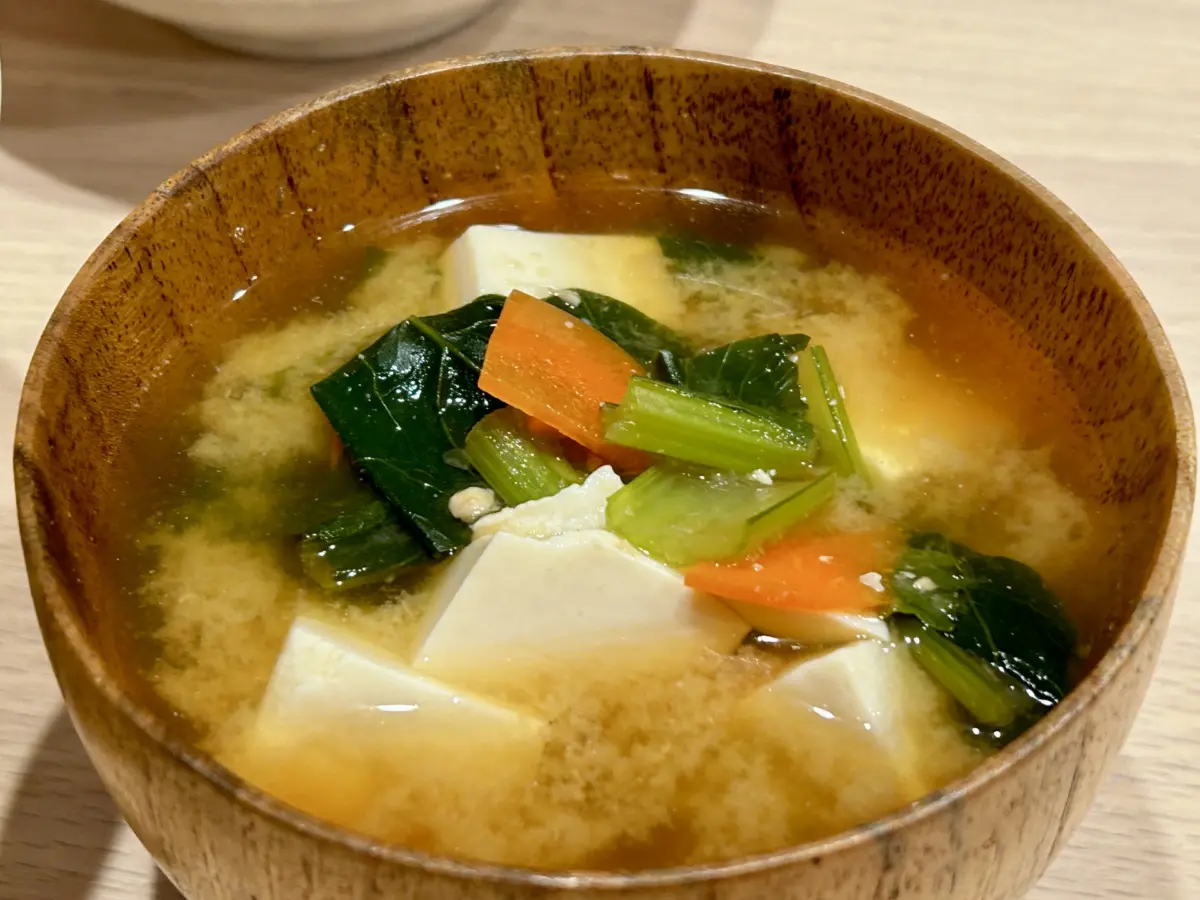 A bowl of traditional Japanese washoku miso soup with tofu and seaweed.