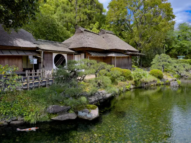 Korakuen Garden in Okayama, featuring tranquil ponds, lush greenery, and views of Okayama Castle.