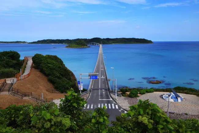 Tsunoshima Bridge stretching over turquoise waters, connecting the mainland to Tsunoshima Island in Yamaguchi.