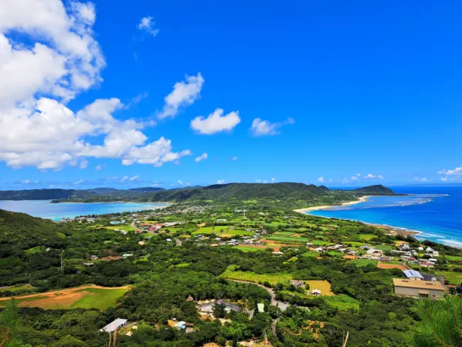 A tropical beach with clear blue waters and coral reefs in the Amami Islands, Kagoshima