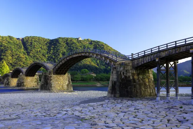 The iconic Kintaikyo Bridge with its elegant five-arch design spanning the Nishiki River in Yamaguchi