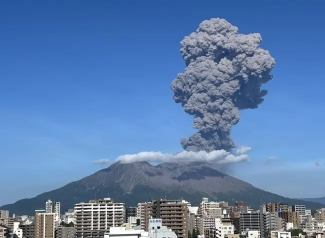 The smoking crater of Sakurajima volcano with a view of Kagoshima Bay