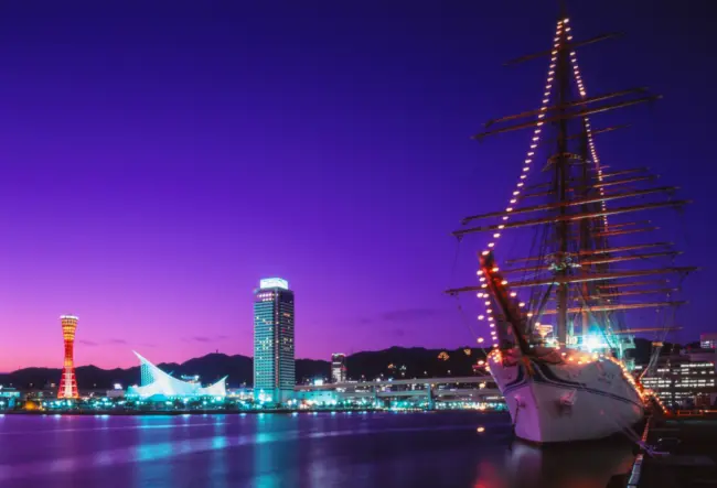 Kobe Harborland at sunset, with the Kobe Port Tower lighting up the skyline.