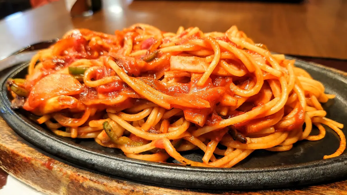 Napolitan spaghetti, a uniquely Japanese pasta dish with ketchup, onions, and sausages.