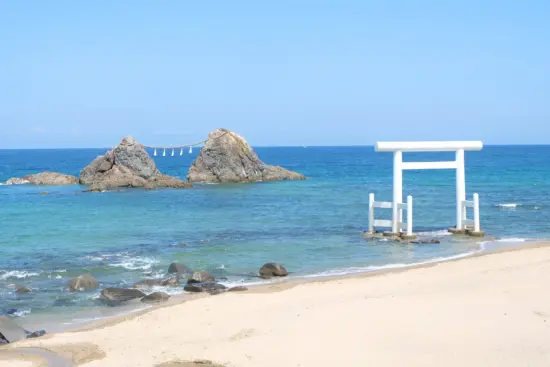 The Futamigaura beach in Itoshima, featuring the iconic married rocks.