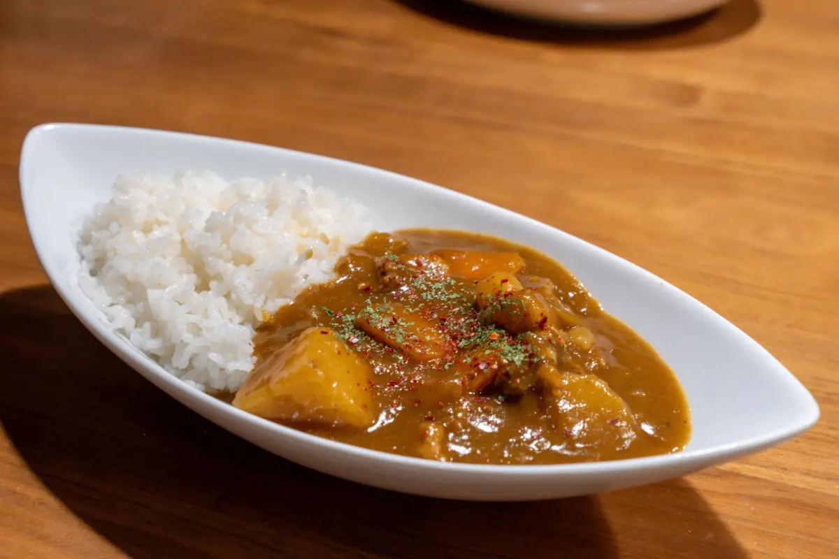 Japanese Cuisine Washoku - A plate of thick and hearty Japanese curry rice with vegetables and meat.