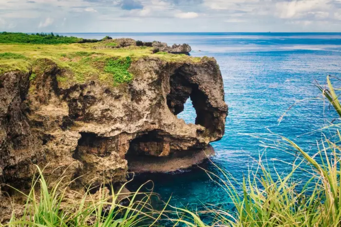 The dramatic limestone cliffs of Cape Manzamo, overlooking the East China Sea in Okinawa.