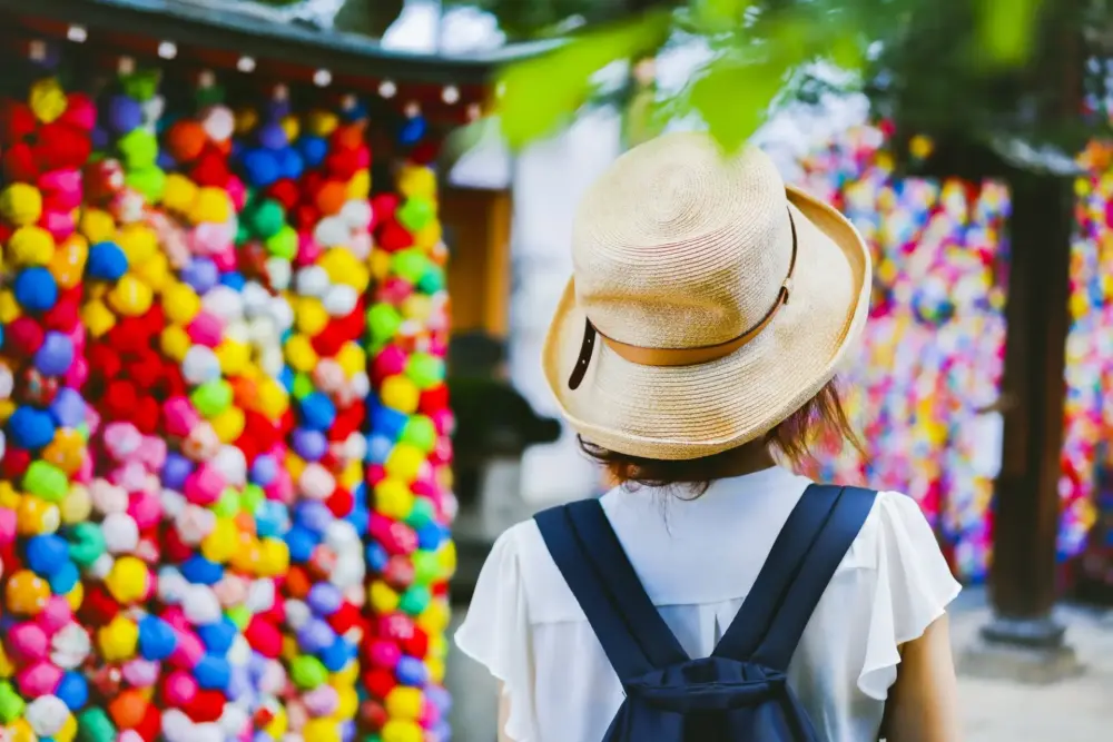 yasaka koshindo temple colorful kukurizaru charms hanging for wishes best photo spots in Kyoto