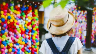 yasaka koshindo temple colorful kukurizaru charms hanging for wishes best photo spots in Kyoto