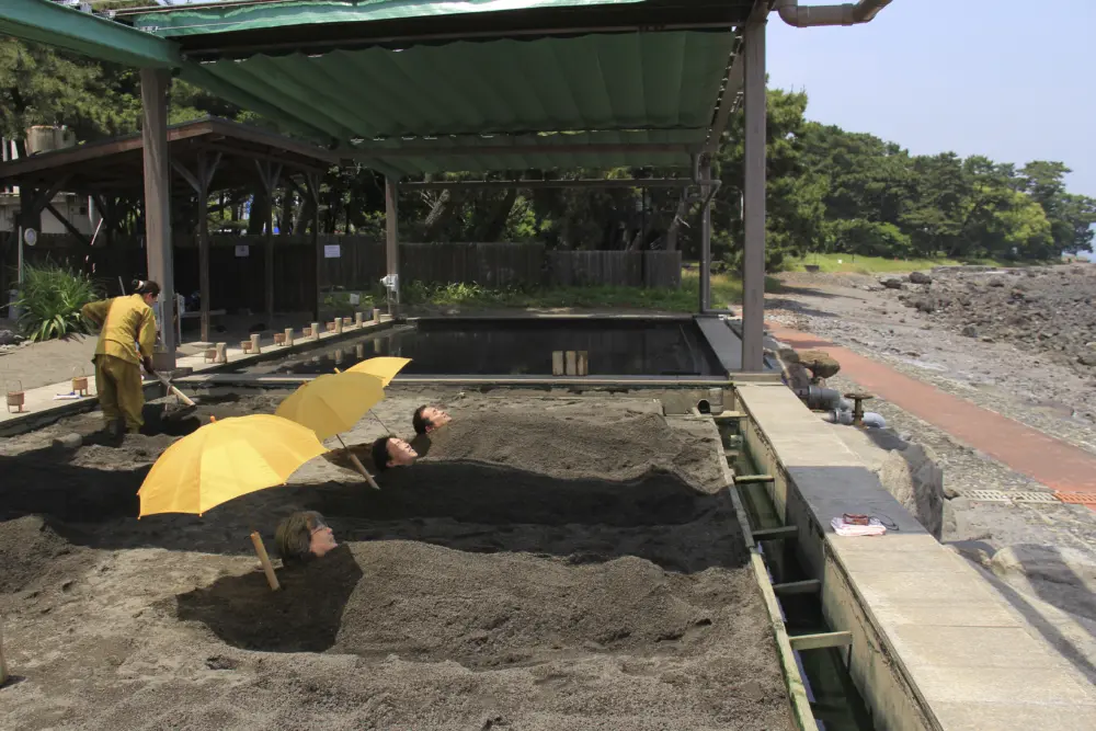 Relaxing sand bath experience at Beppu Beach Sand Bath near Shoningahama Beach.