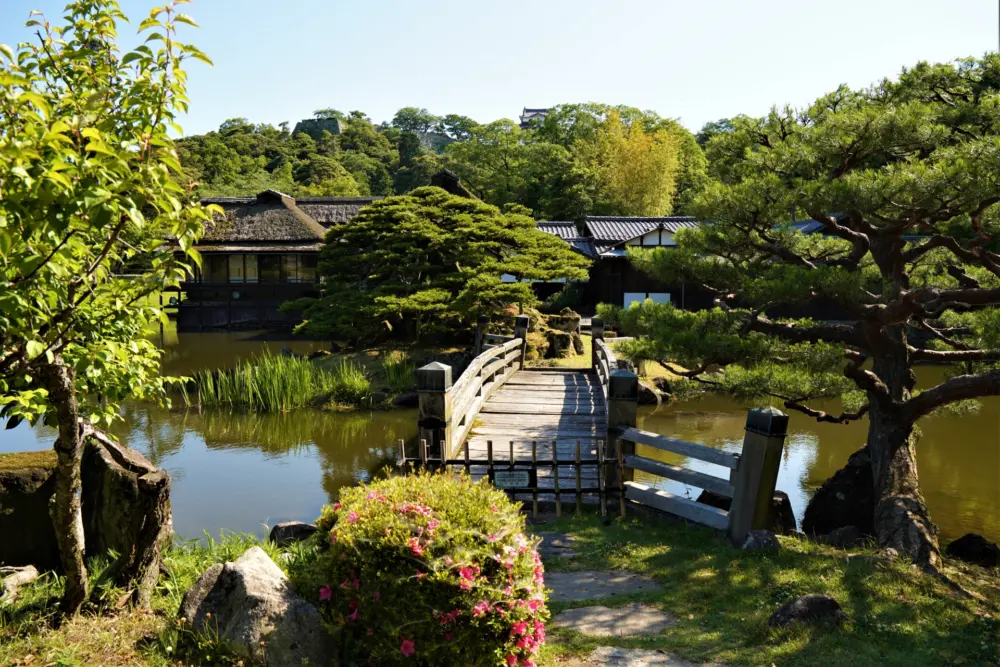 Genkyu-en Garden with pond and traditional teahouse.