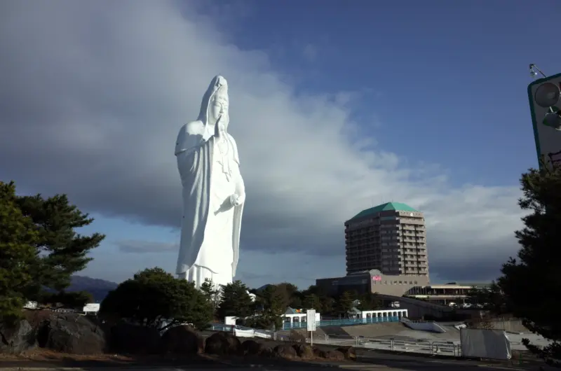 Sendai Daikannon statue towering against the sky.