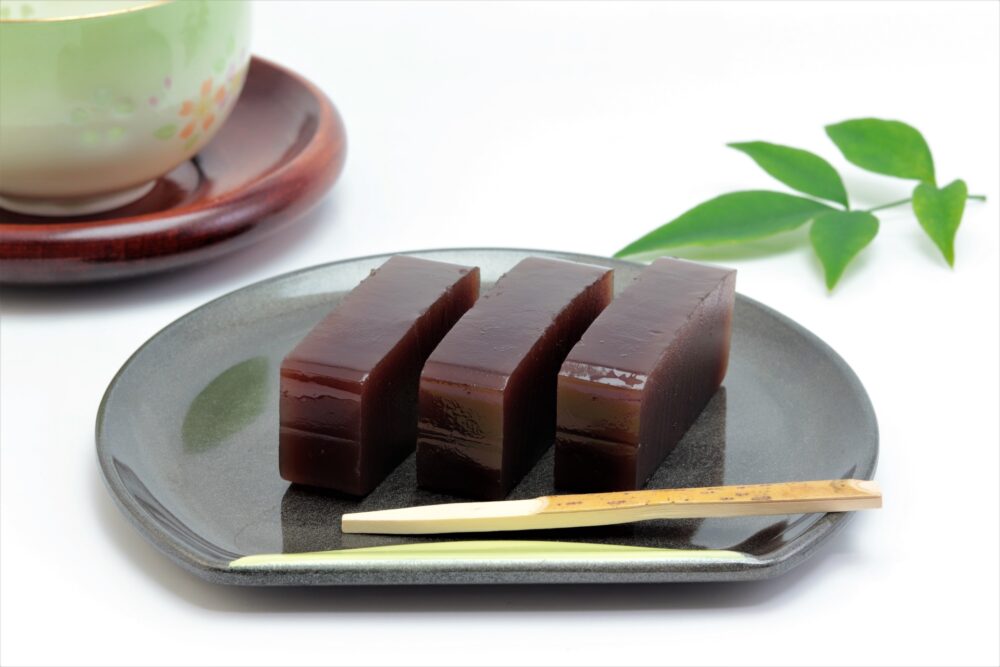 A firm, jelly-like wagashi made from red bean paste and agar.